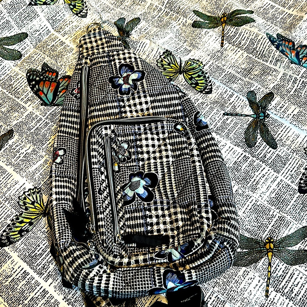 Like new a Vera Bradley Sling Bag